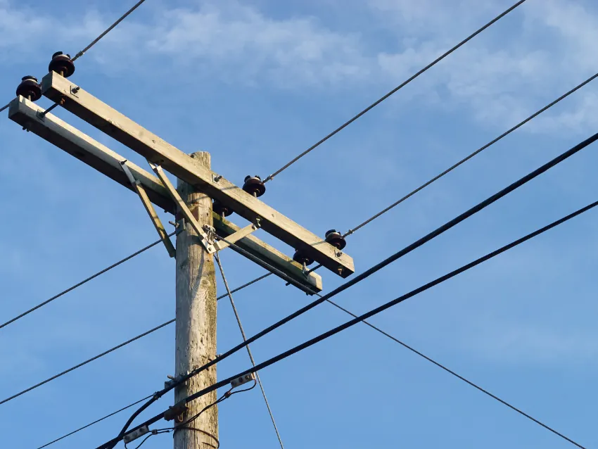 Power lines on a wooden utility pole