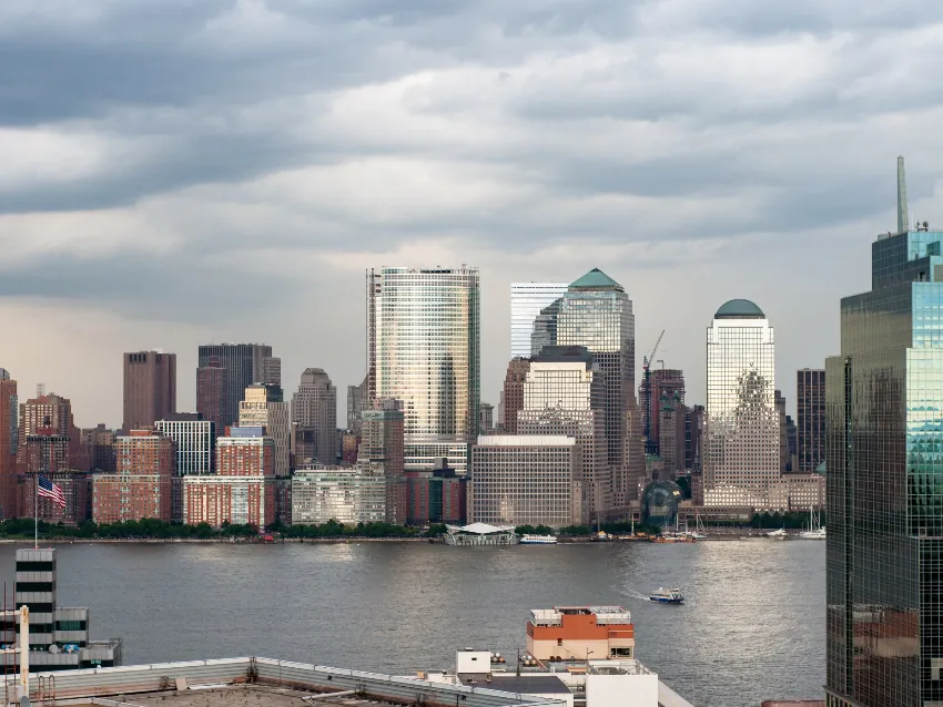 City skyline of office towers across the river